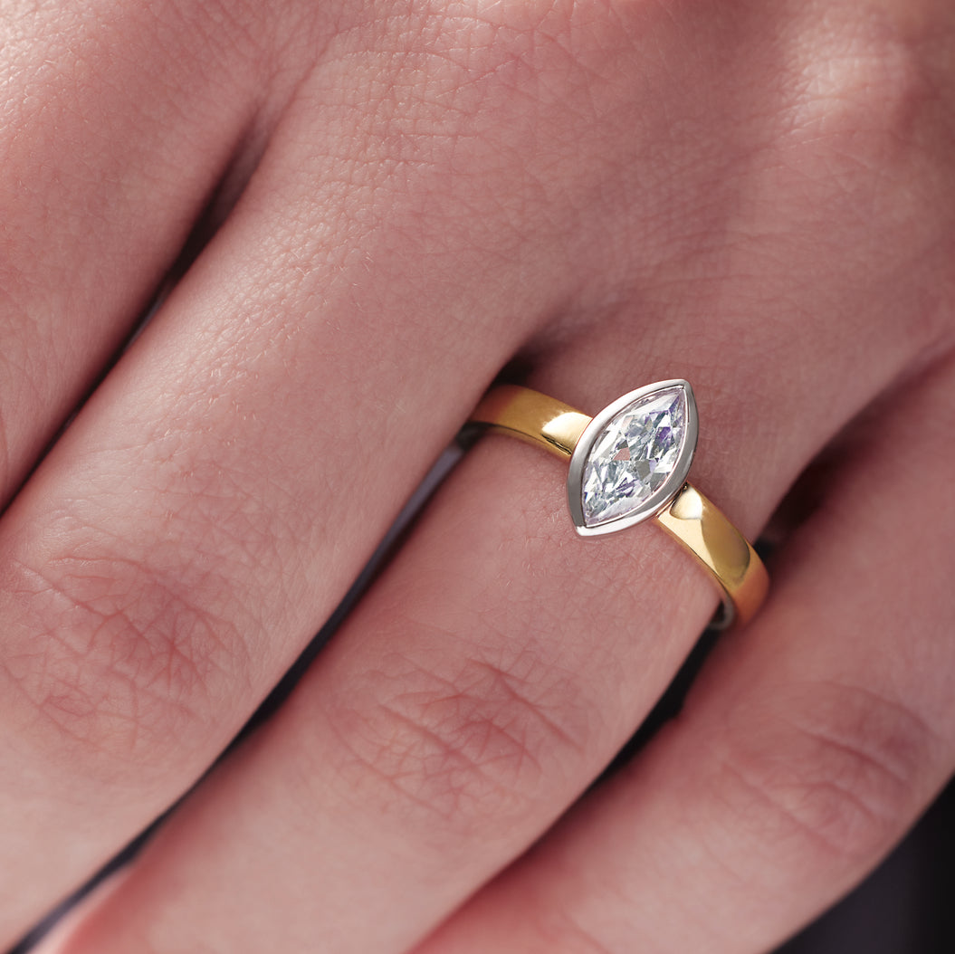 Bezel marquise engagement ring