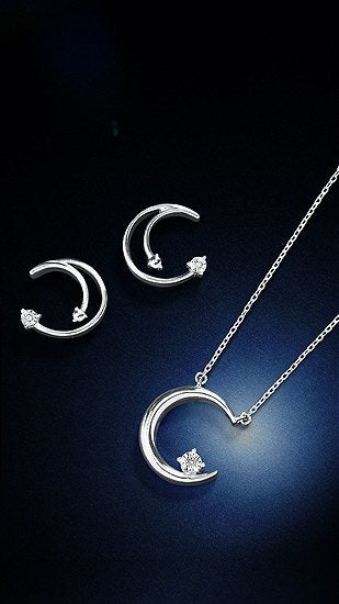 Sterling Silver 0.01ctw Moon and Star Diamond Stud Earrings