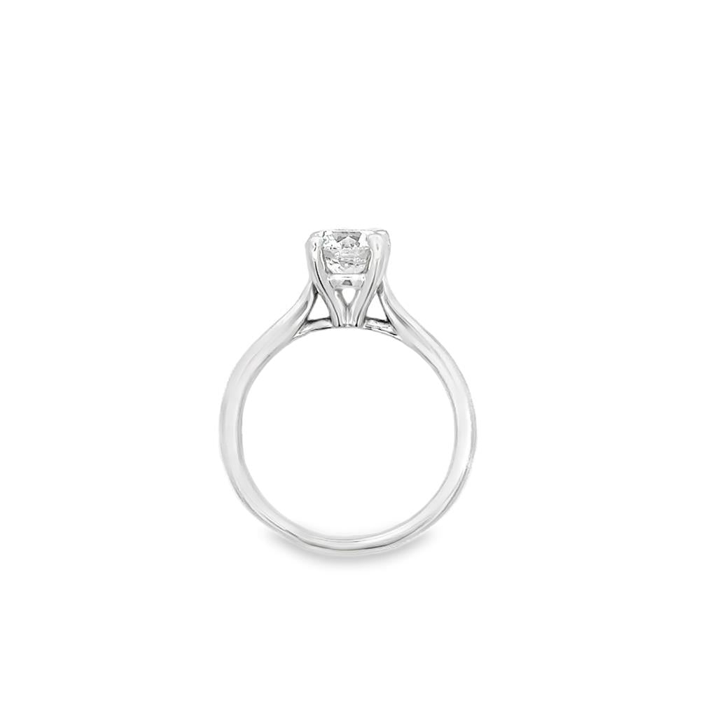 Discover timeless elegance with our 14K white gold solitaire cathedral engagement ring. Featuring a 1.01 carat round diamond with D color and VS2 clarity, this ring is the ultimate symbol of love.