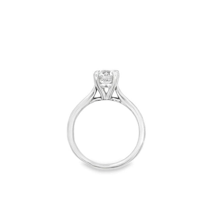 Discover timeless elegance with our 14K white gold solitaire cathedral engagement ring. Featuring a 1.01 carat round diamond with D color and VS2 clarity, this ring is the ultimate symbol of love.